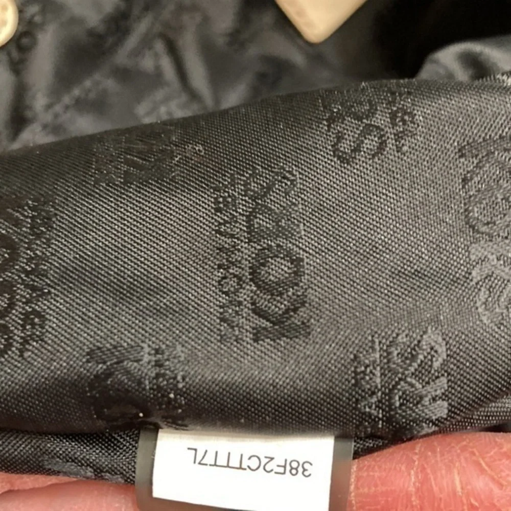 Michael Kors scuffs around