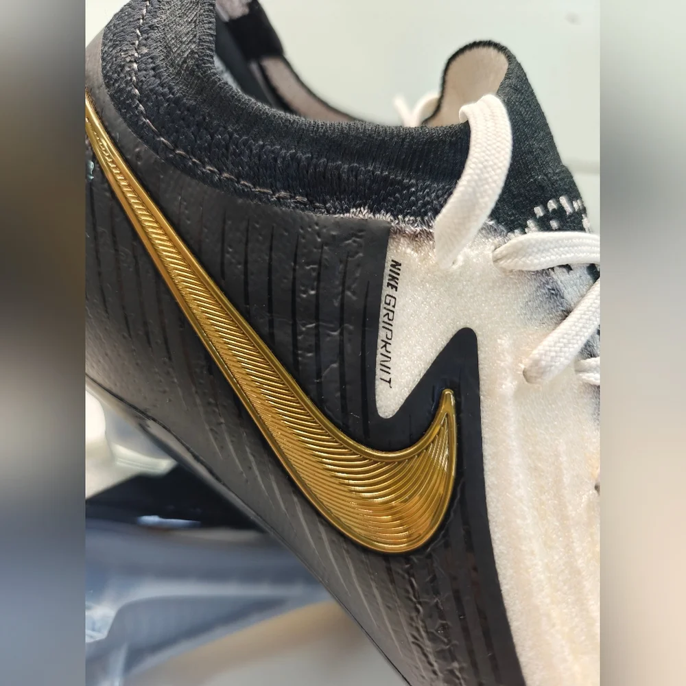 Nike cleat “mad