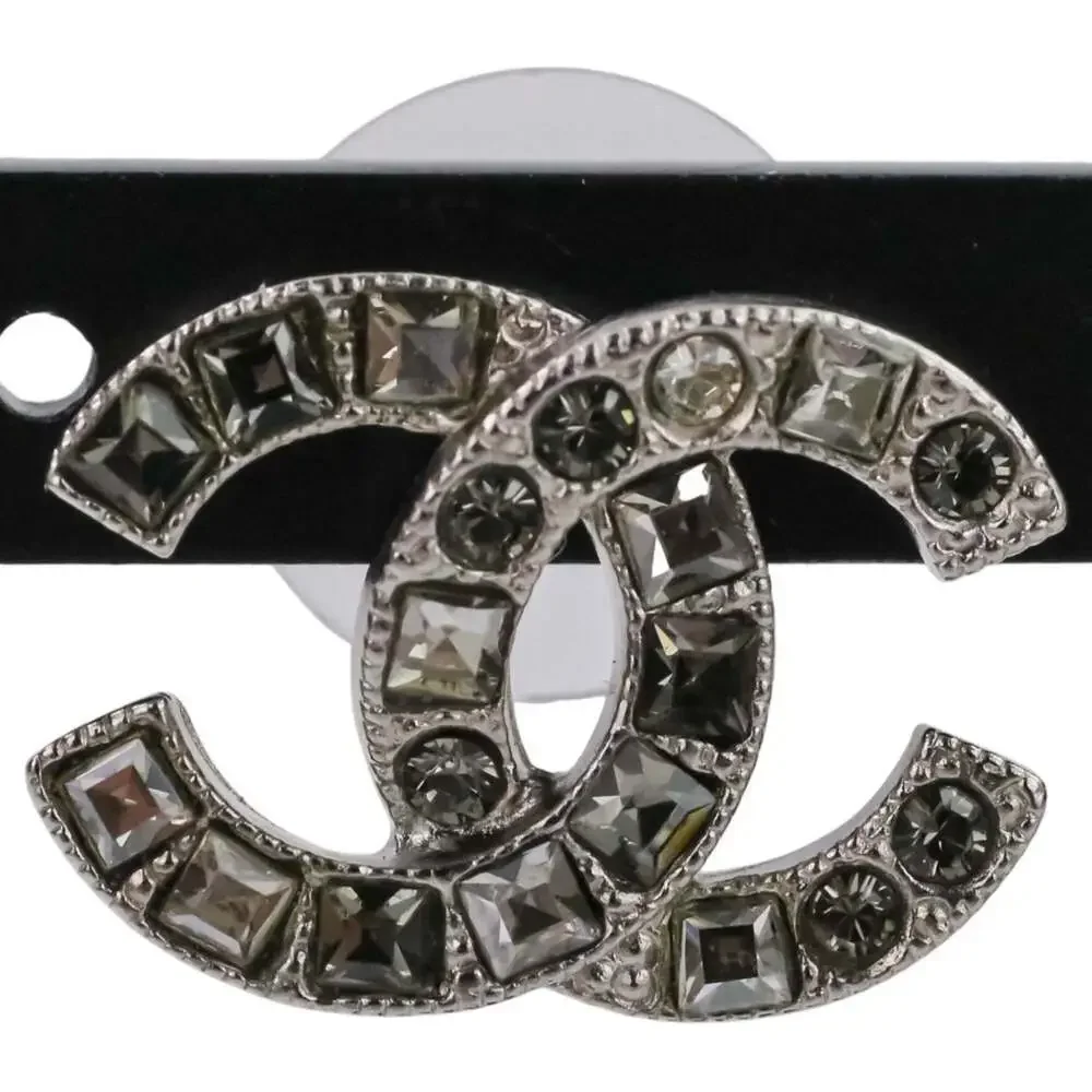 CHANEL silver logo