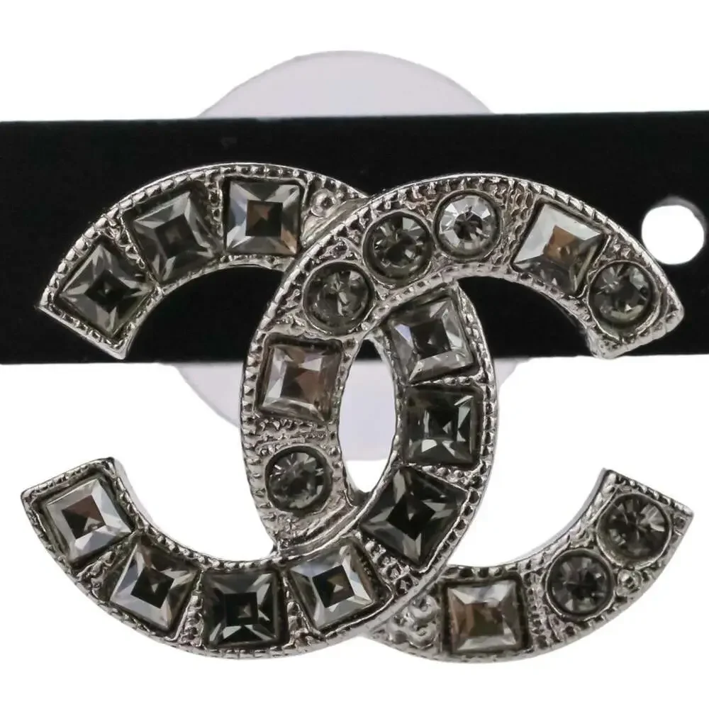 CHANEL silver logo