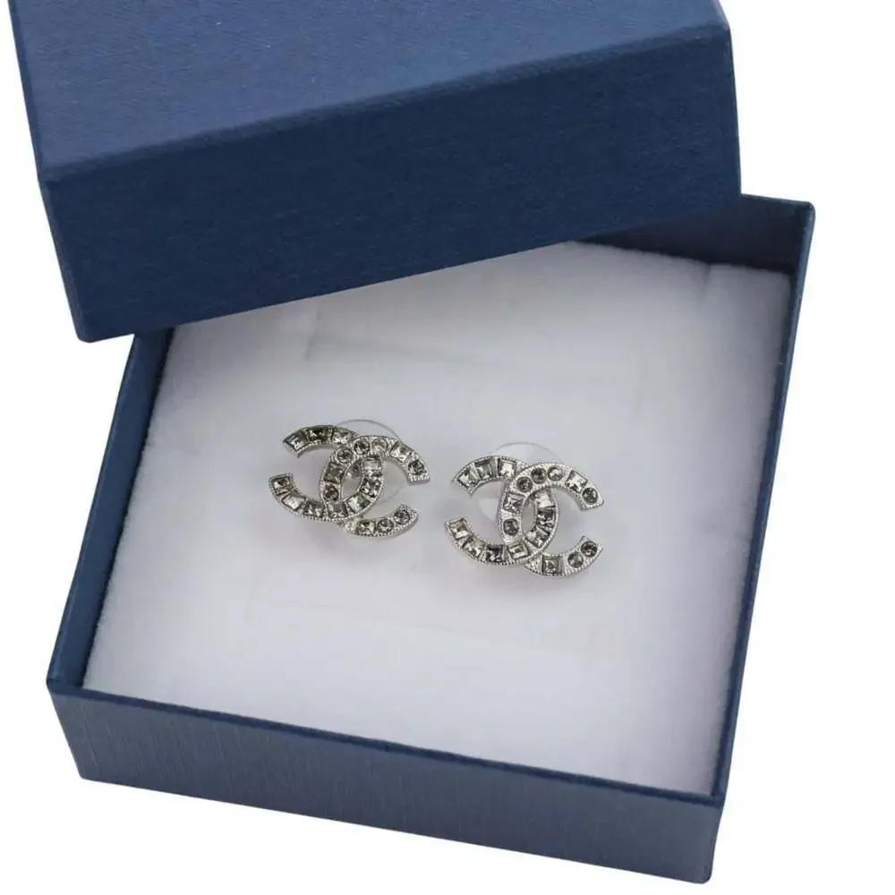 CHANEL silver logo