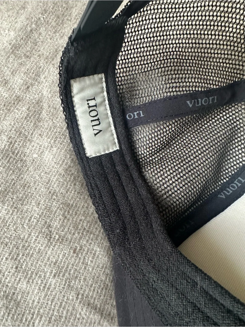 Vuori branded trucker