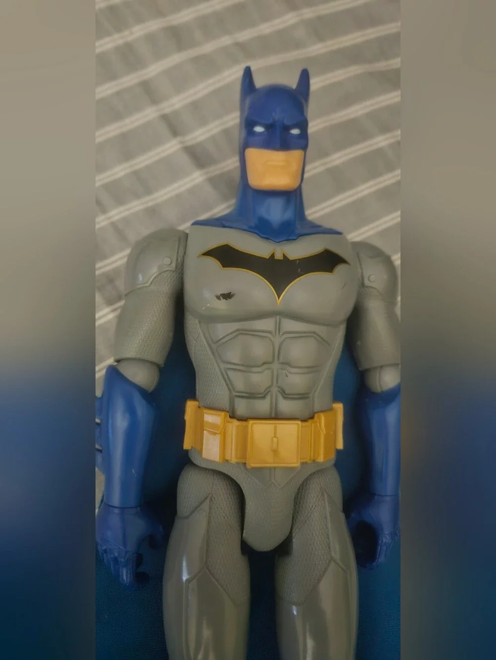 DC Comics gray figure arms