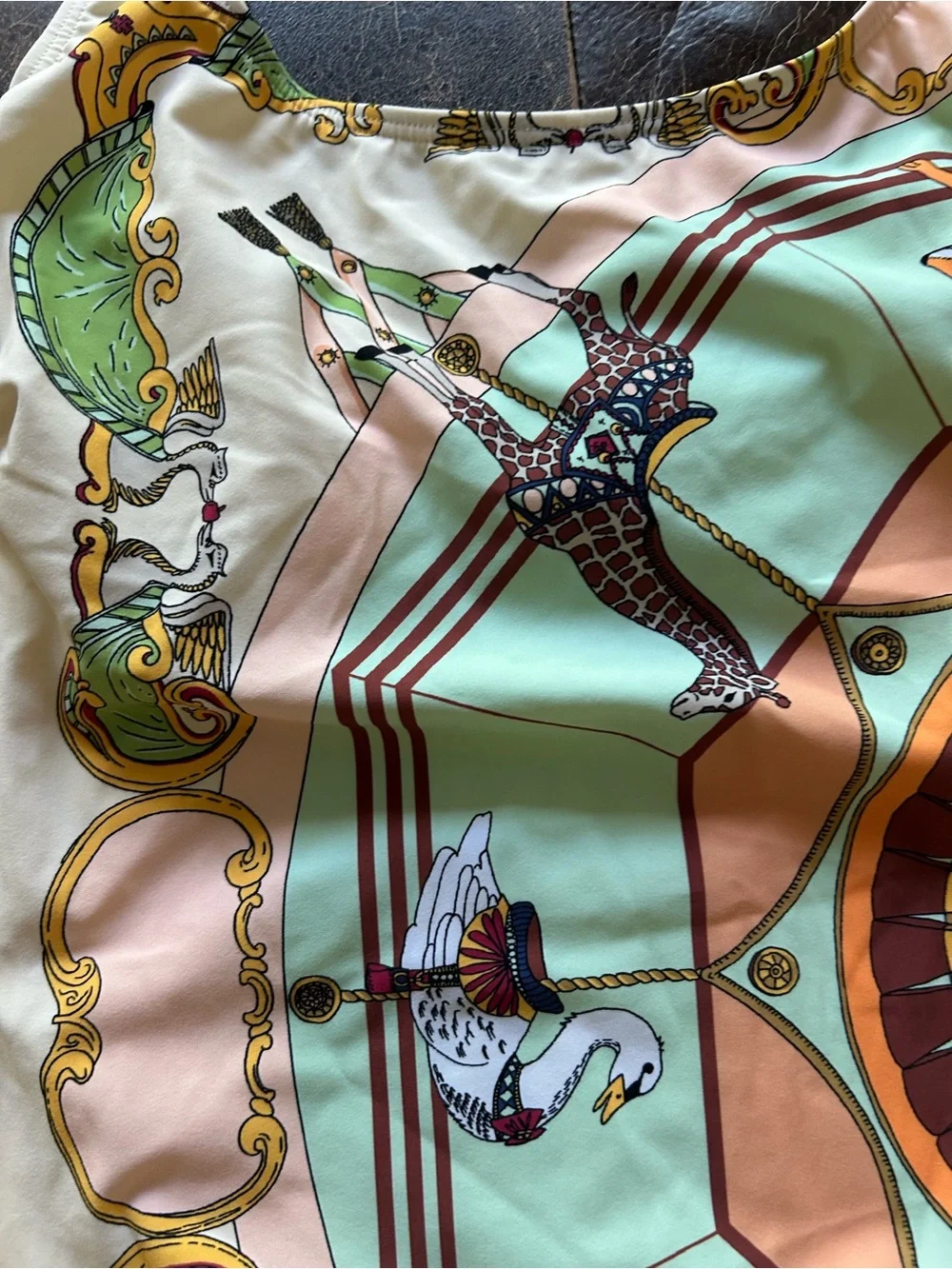 Tory Burch carousel motif
