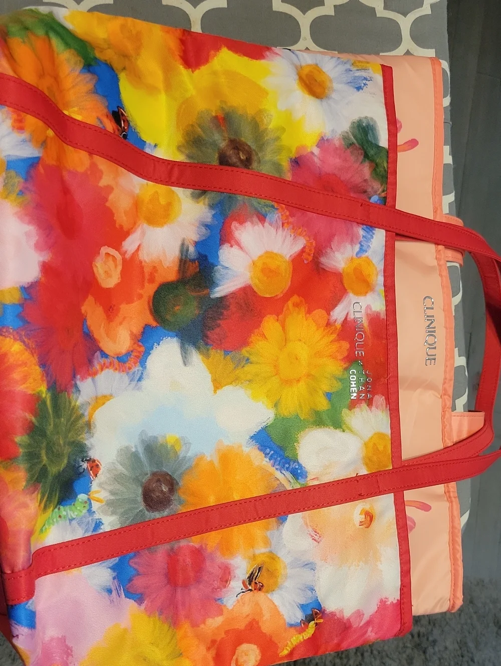 Clinique Multicolor Floral Tote with Red Straps