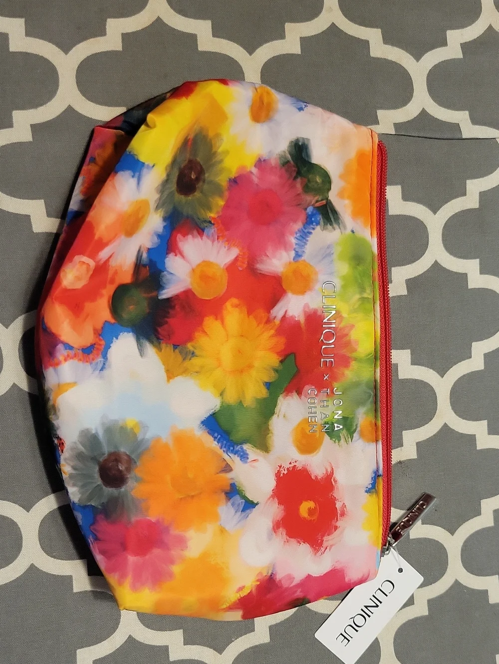 Clinique Multicolor Floral Tote with Red Straps