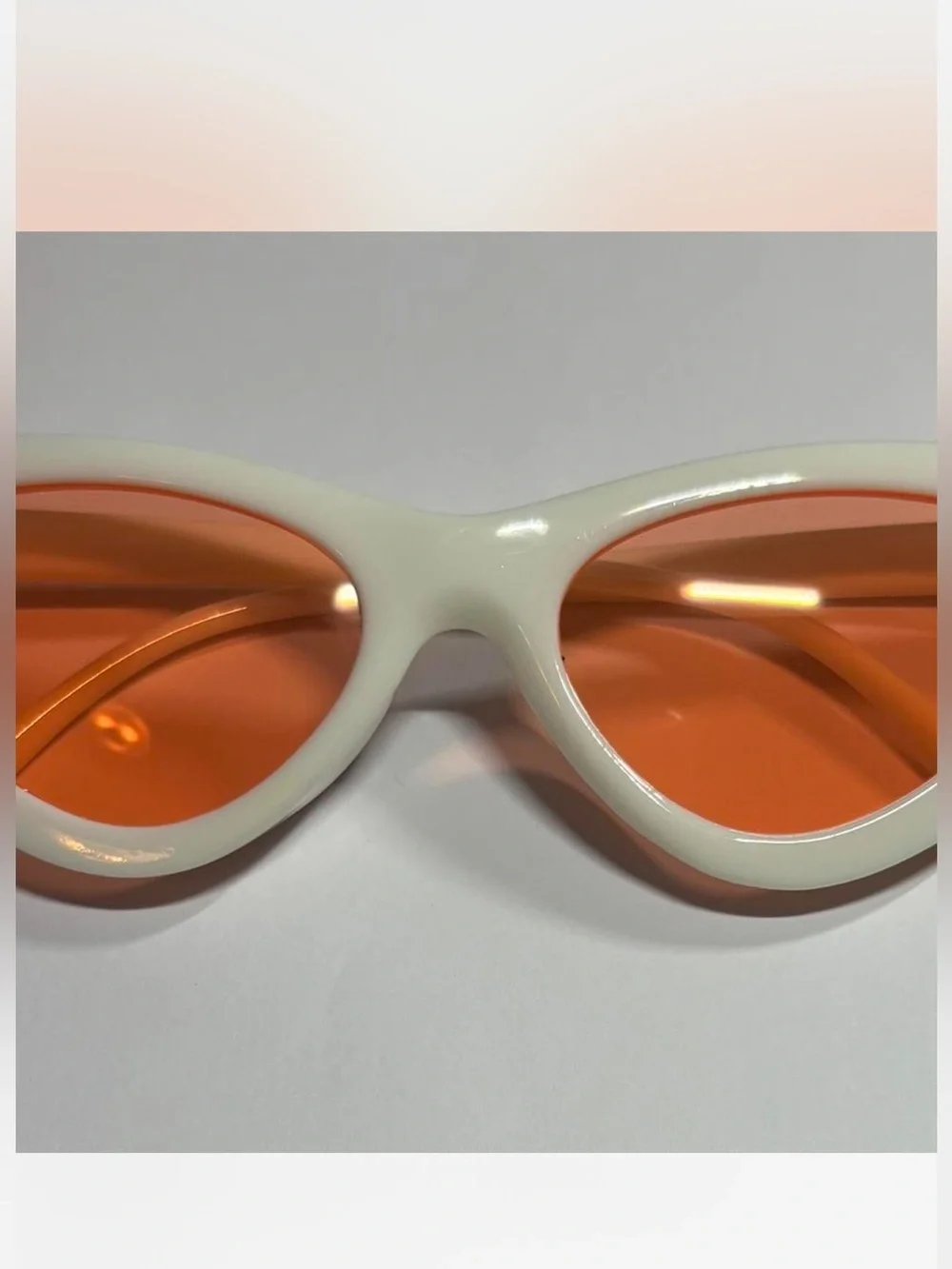 White with orange lens cat eye sunglasses New