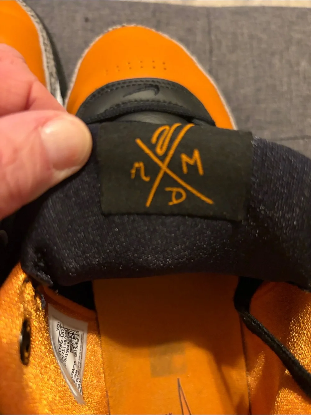 Nike Men’s Black & Orange Low-Top Sneakers