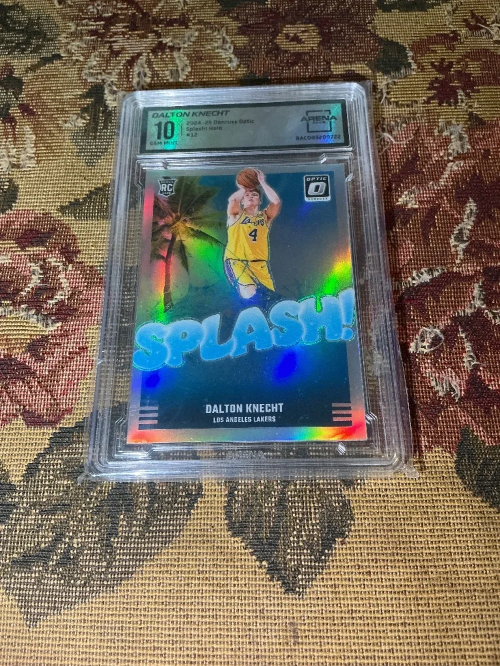 2024-25 Panini Donruss Optic Splash Dalton Knecht #12 Holo rookie grade Arena 10