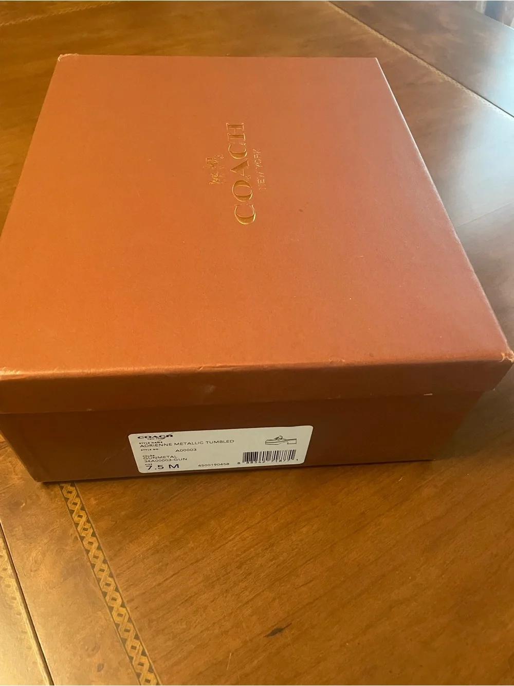 Coach collection metal clogs