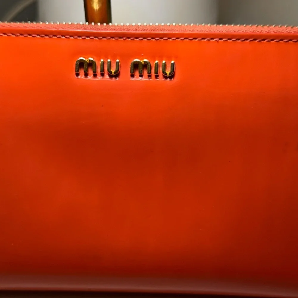Miu Miu bold orange
