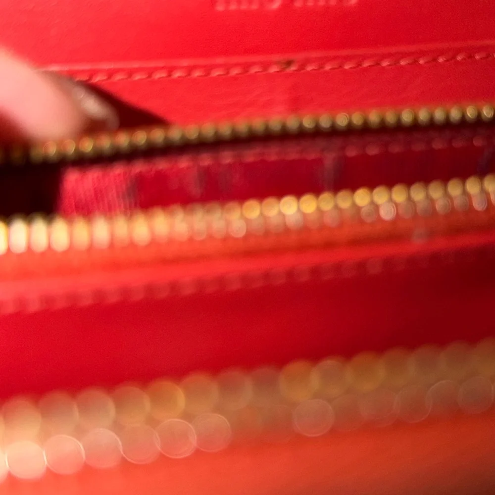 Miu Miu bold orange