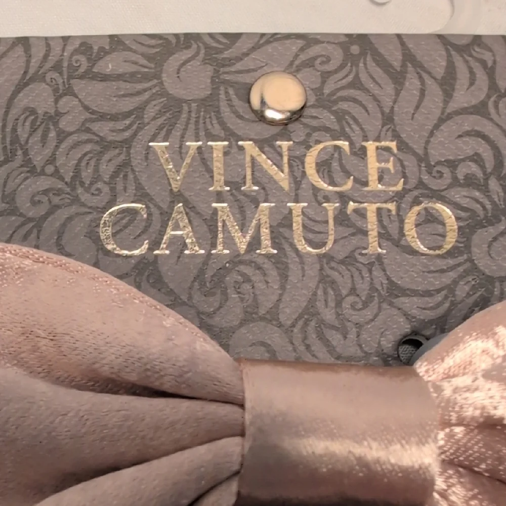 Vince Camuto enhance your
