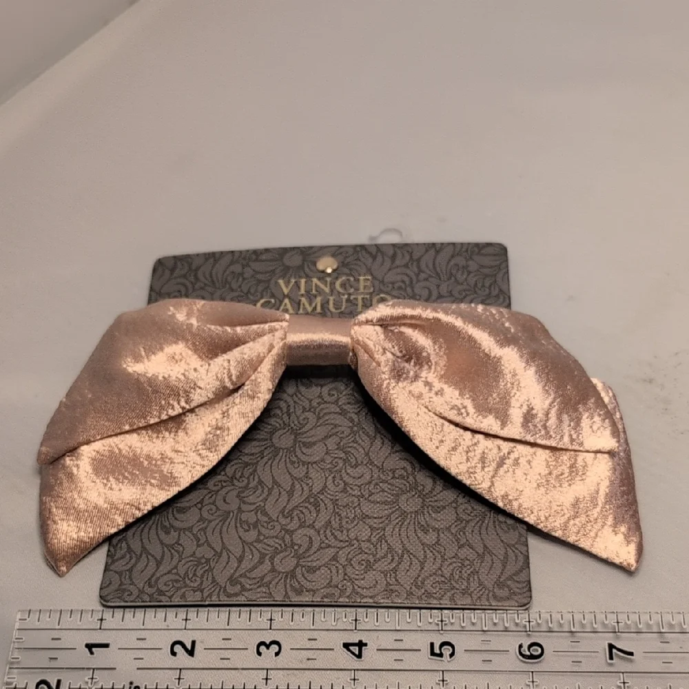 Vince Camuto enhance your