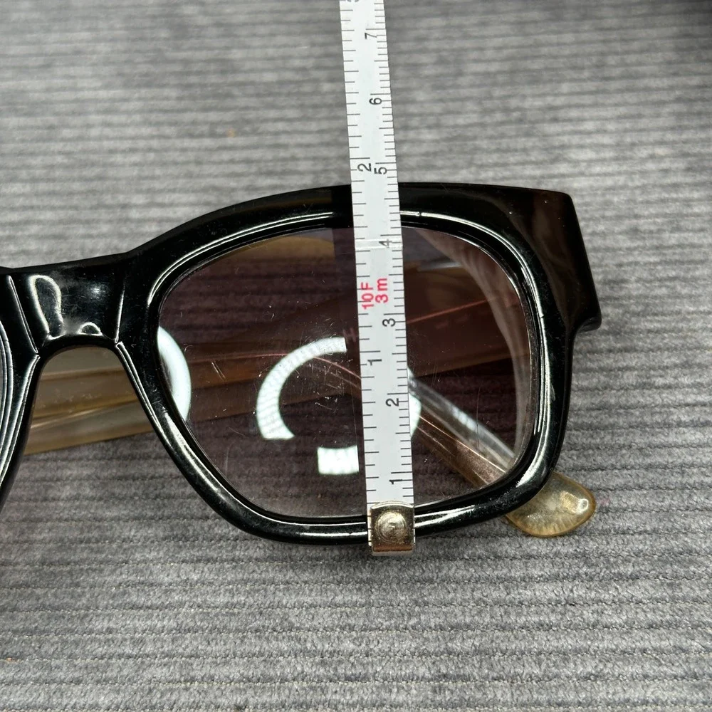 Cole Haan includes lenses arm