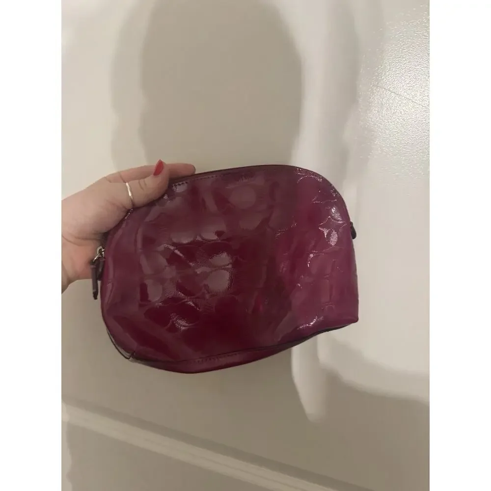 Coach raspberry embossed