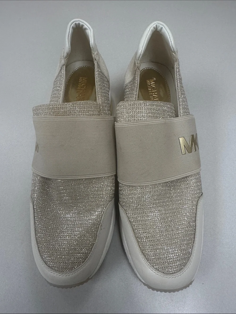 MICHAEL KORS Women’s Size 10 Felix wedge champagne gold slip on fashion sneakers