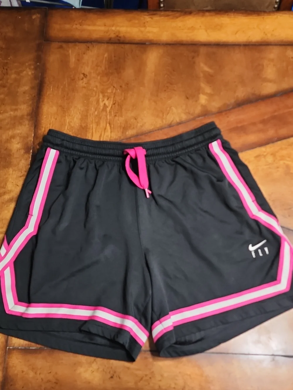 L Nike Women’s Black Athletic Shorts with Pink Trim