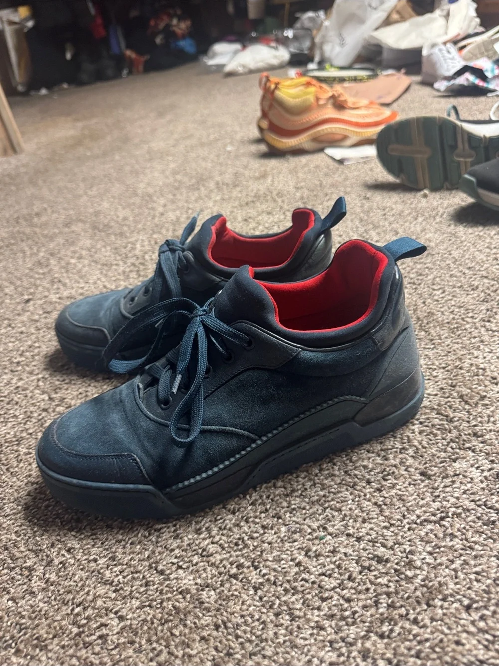 Christian Louboutin interior suede well
