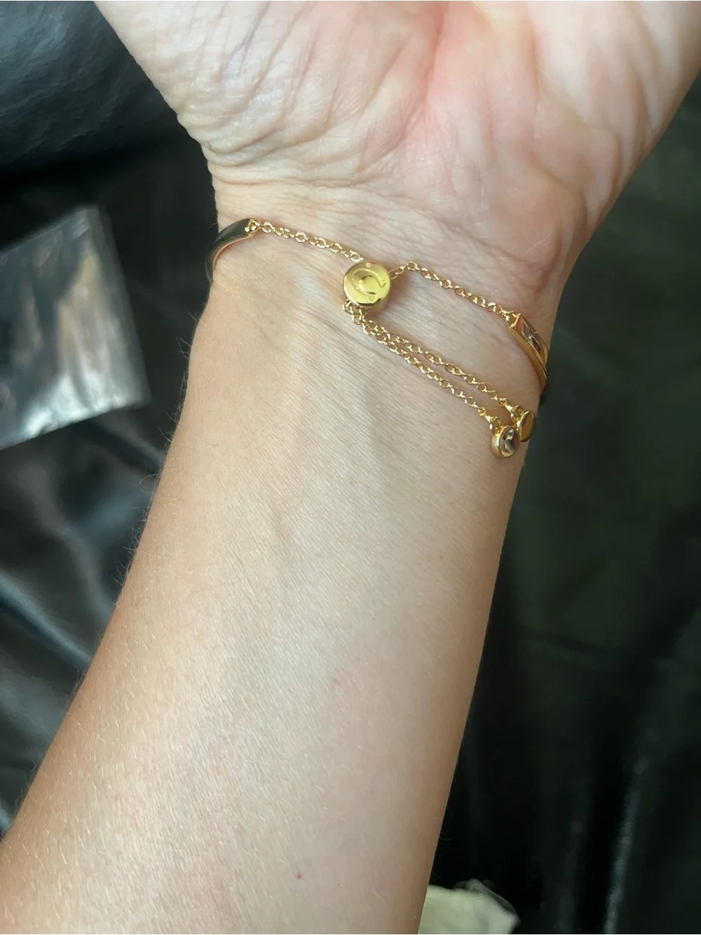 Coach gold tone
