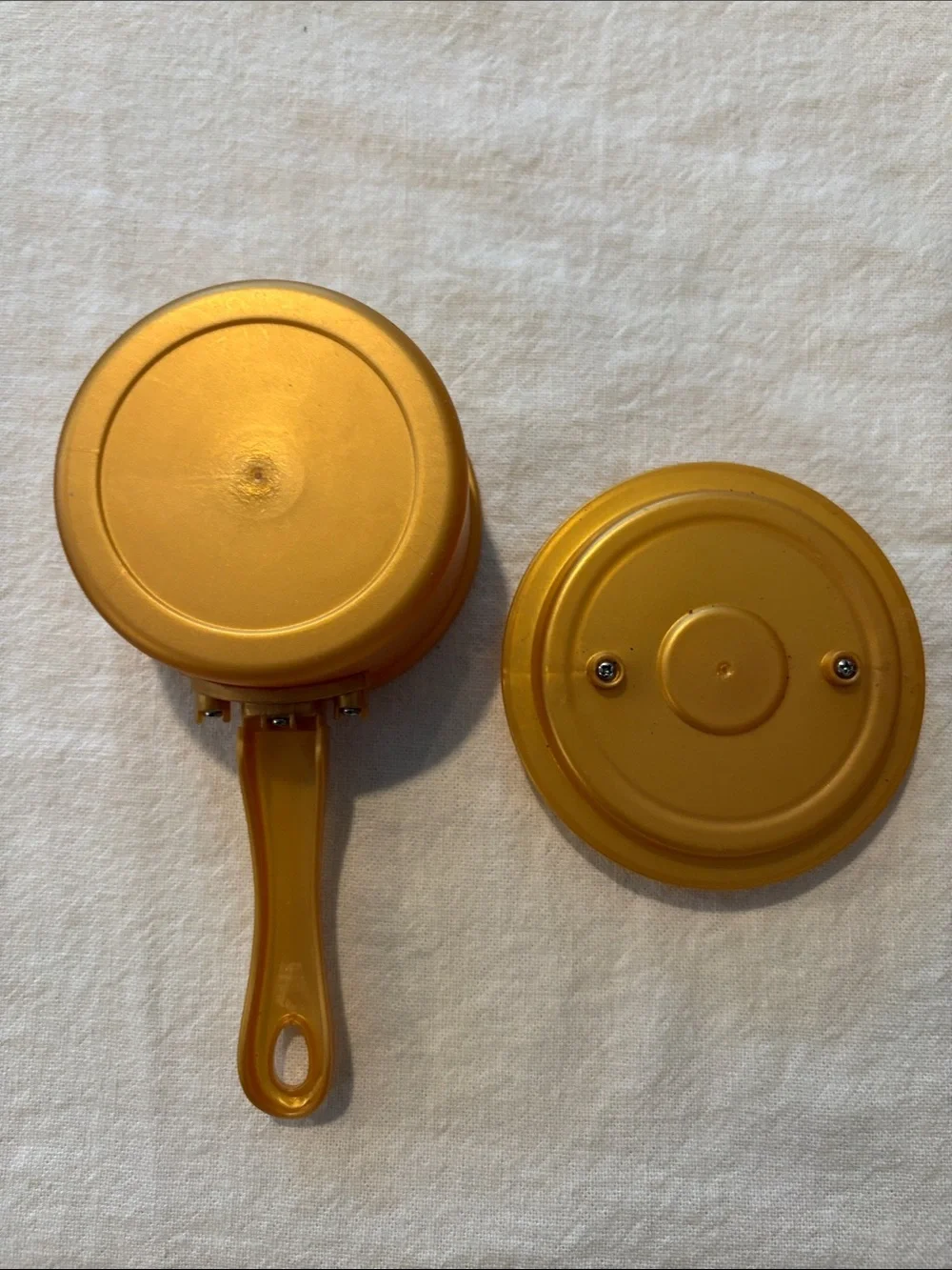 Source Unknown gold plastic
