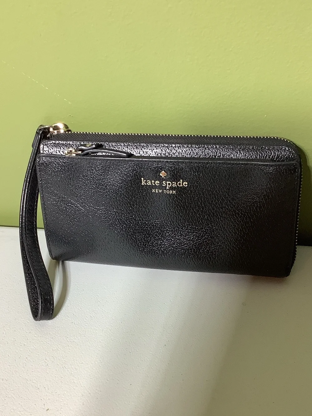 Kate Spade NY black zip around wristlet/wallet
