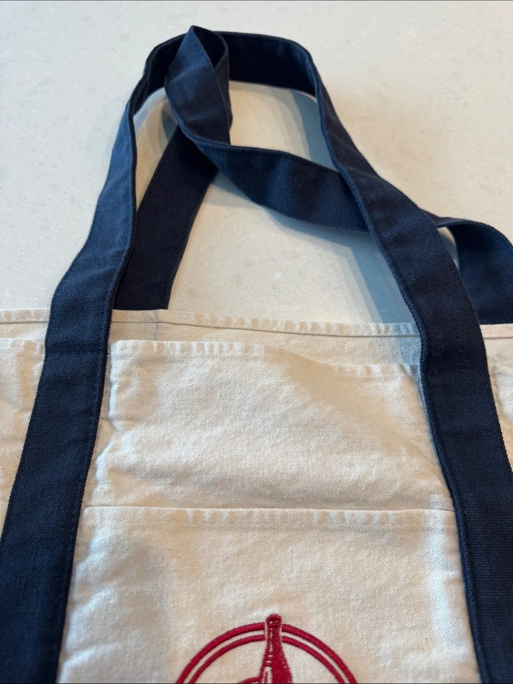 Trader Joe's Canvas Tote Bag in Cream and Navy black embroidered logo