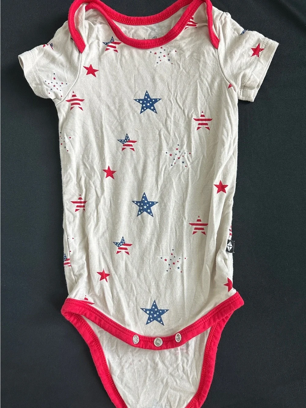 Kyte BABY White Onesie with Red Trim and Blue & Red Star Print