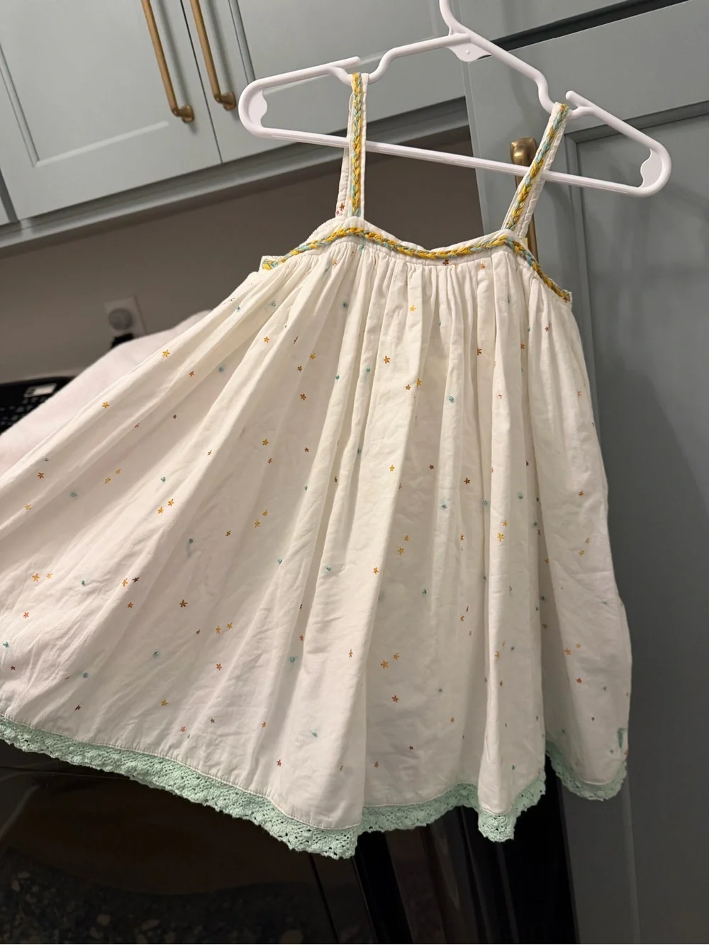 Well Dressed Wolf Cream Sundress with Yellow and Mint Accents