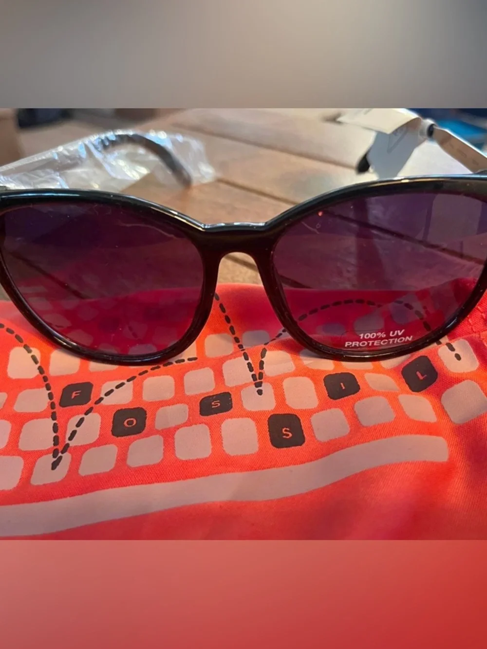 Fossil Semi Cat-Eye Sunglasses with Black & Silver Frame. 100% UV Protection