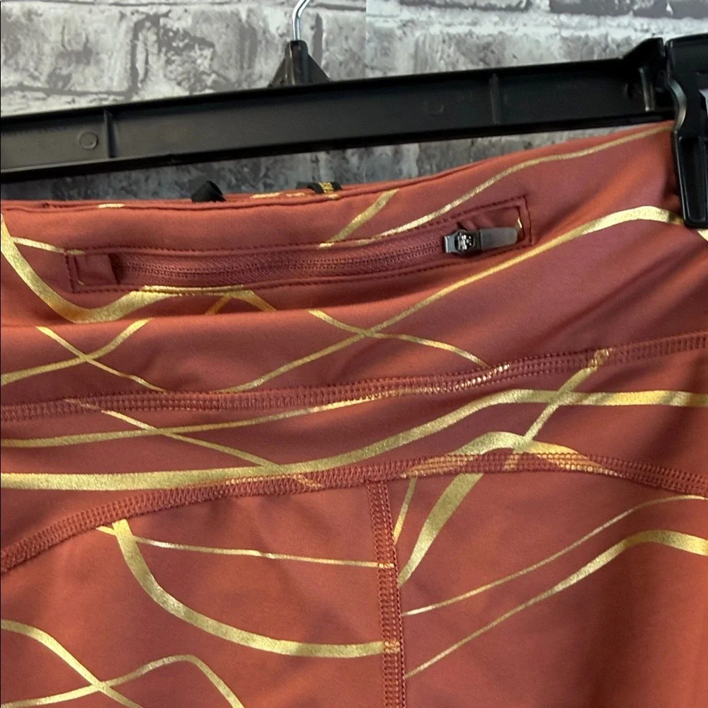 Nike running Copper and Gold Patterned Leggings‎
