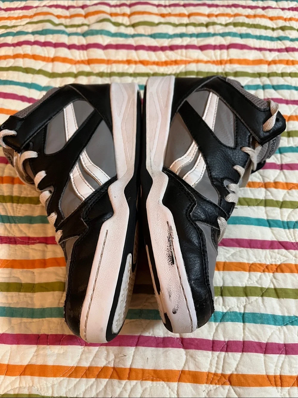 Gray and black Reebok youth size 5