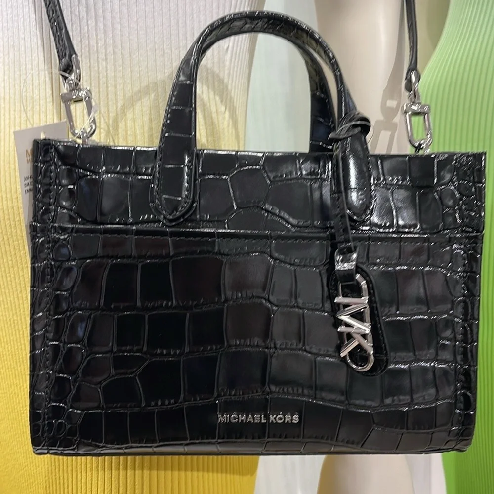 Michael Kors charm perfectly embossed