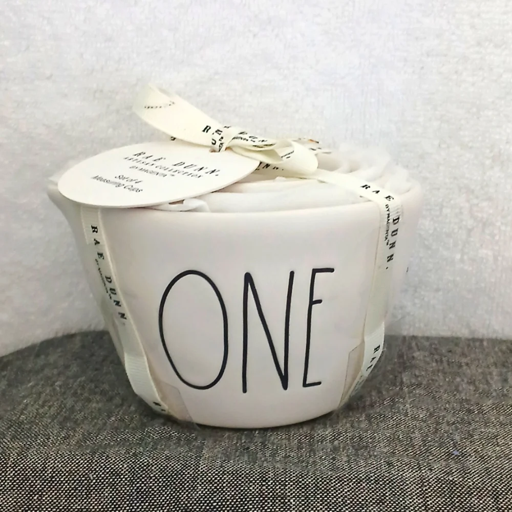 White matte ceramic measuring cups by Rae Dunn