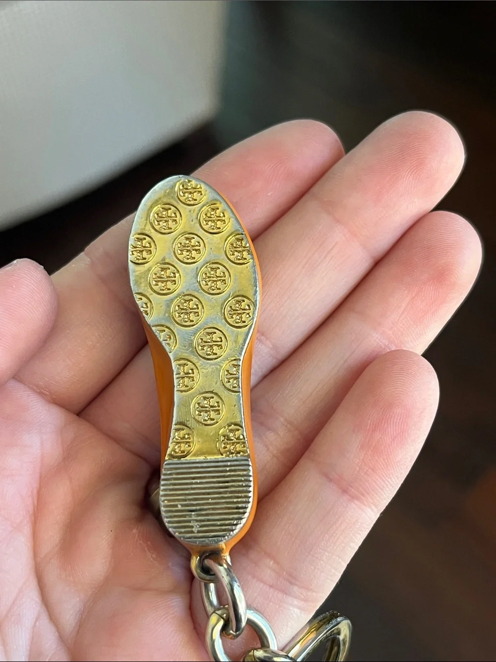 Tory Burch or secure