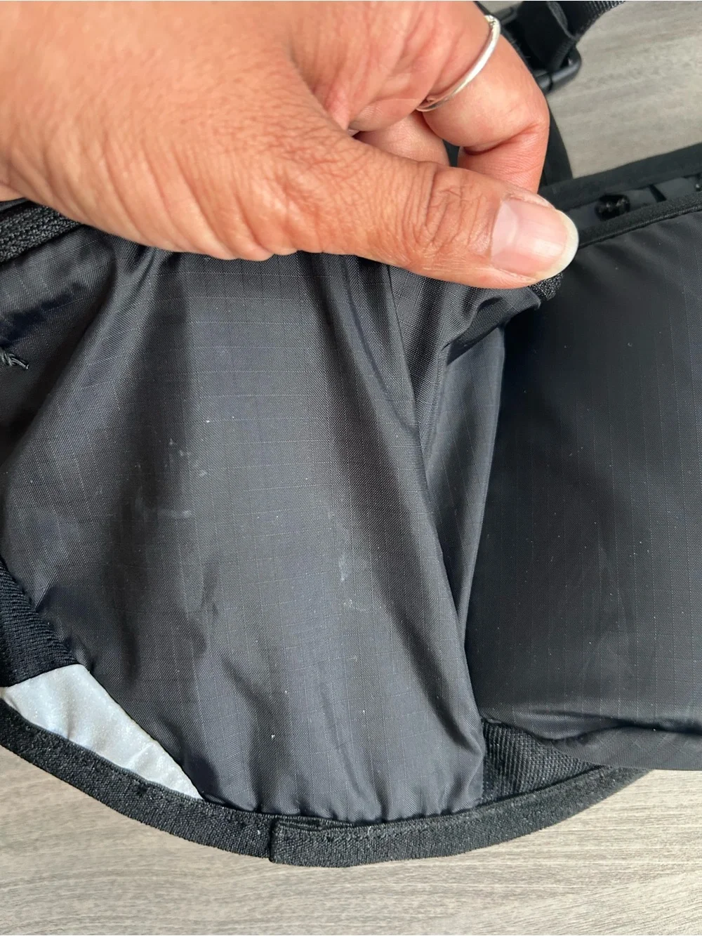 The North Face Black Sling Belt Bag with White Logo