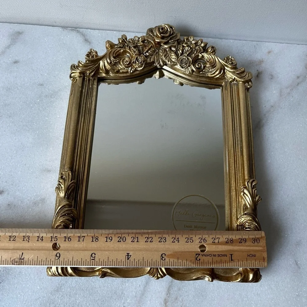 Nicole Miller gold ornate