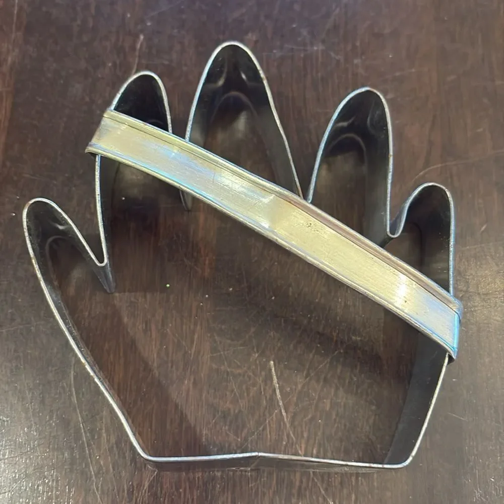 Vintage cookie cutters, hand and donut