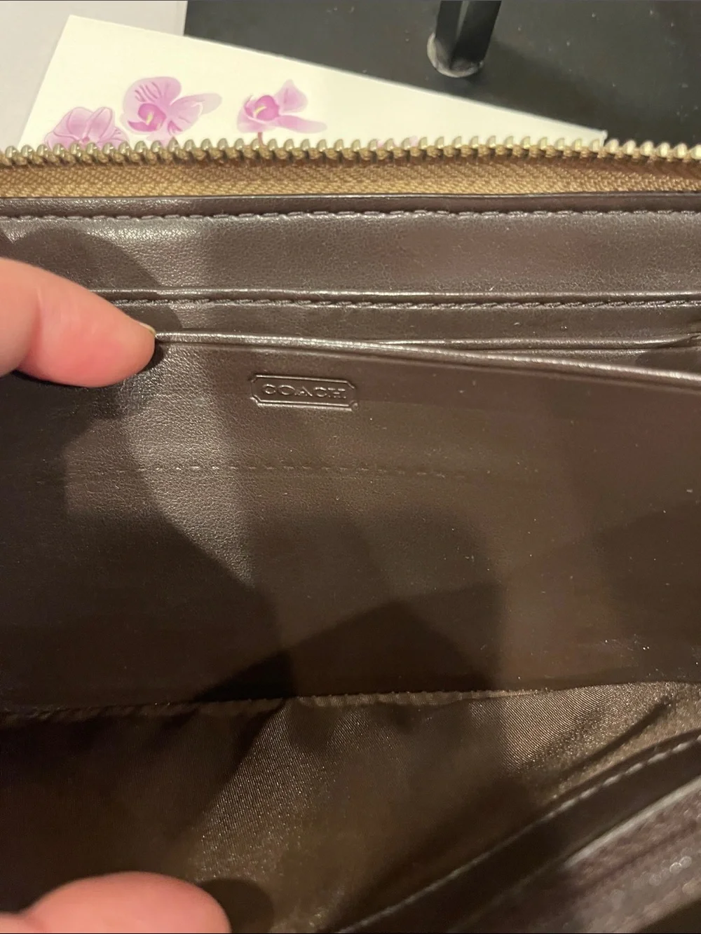 Coach sleek zip