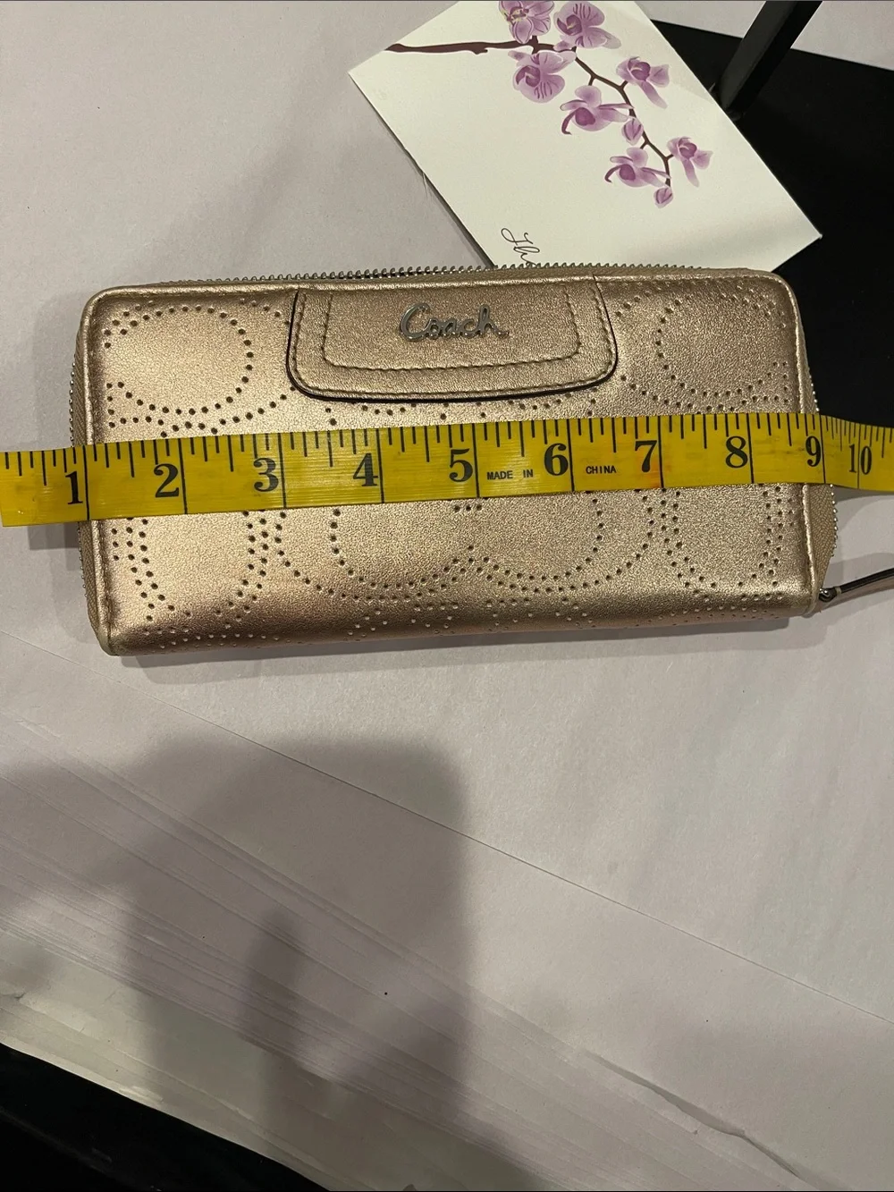 Coach sleek zip