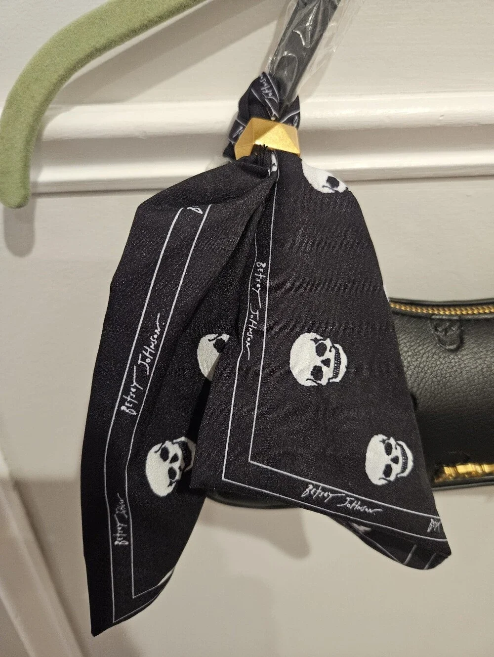 Betsey Johnson Black Leather Shoulder Bag with Skull Emboss and Scarf Accent