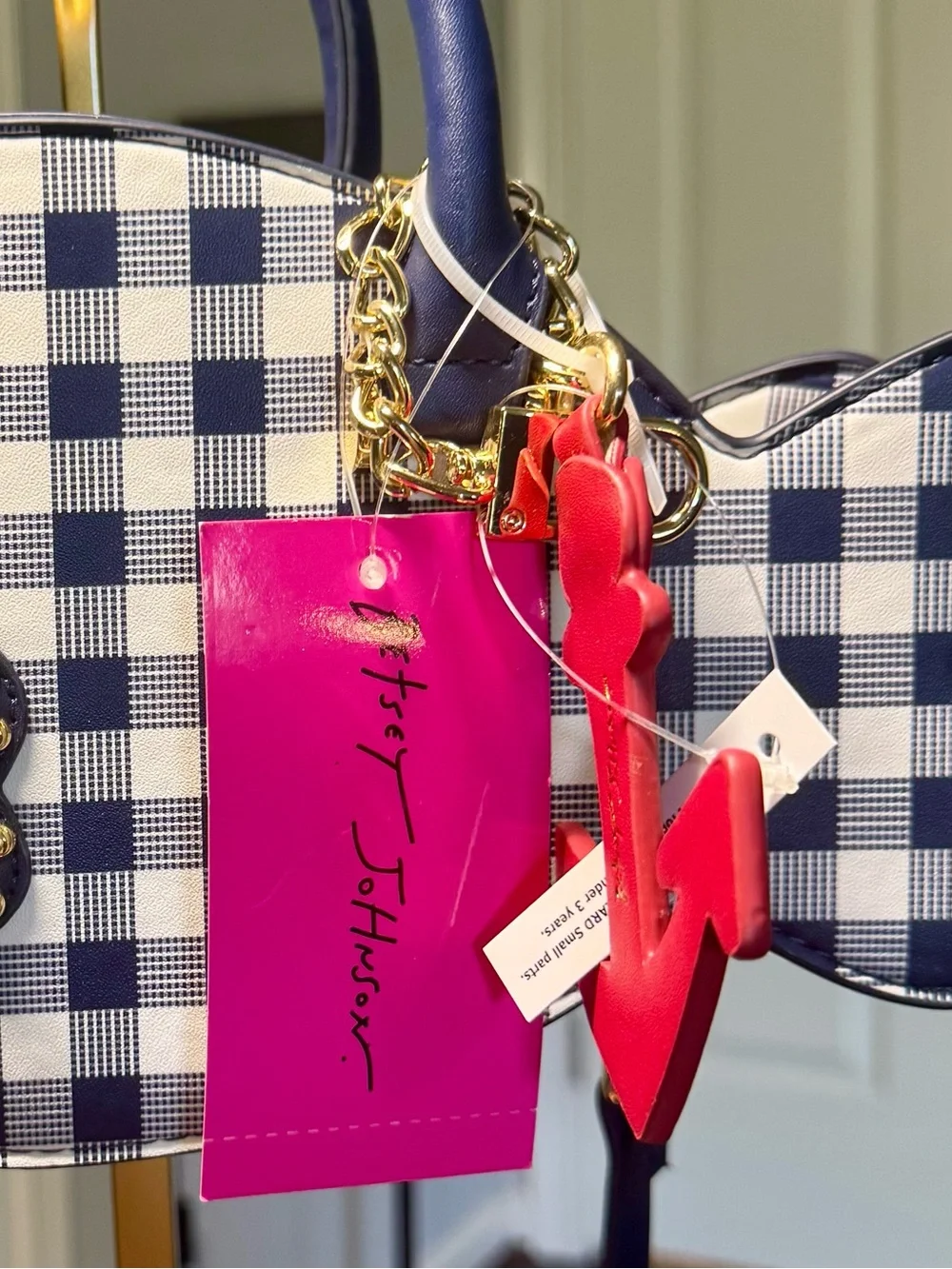 Betsey Johnson zip gold