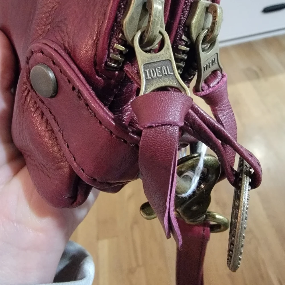 Wanderers Travel Co perfect burgundy