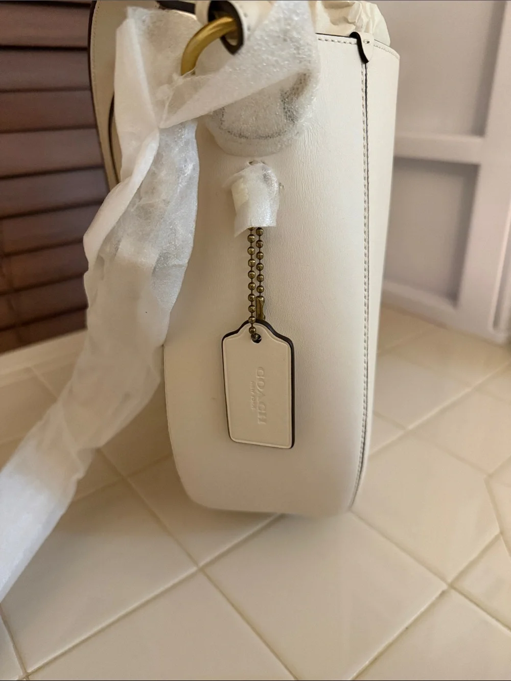 Coach elegant cream