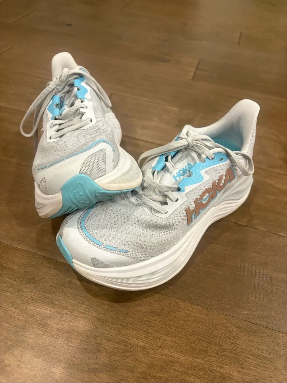 Hoka White and Light Blue Cushioned Running Sneakers