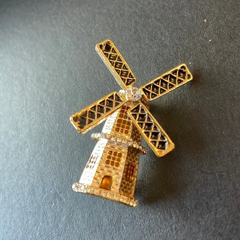 Anthropologie windmill gold