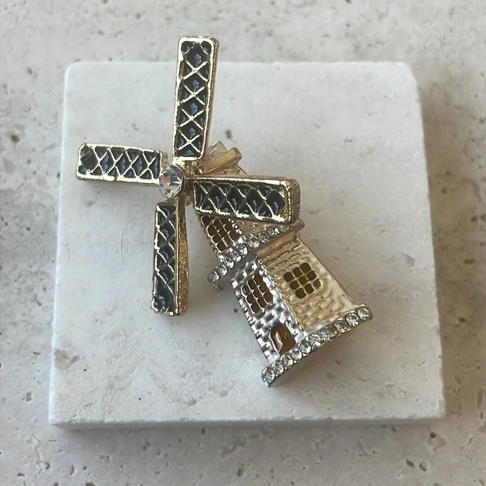 Anthropologie windmill gold