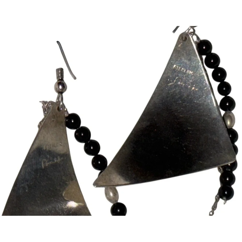Artisan black illegible geometric