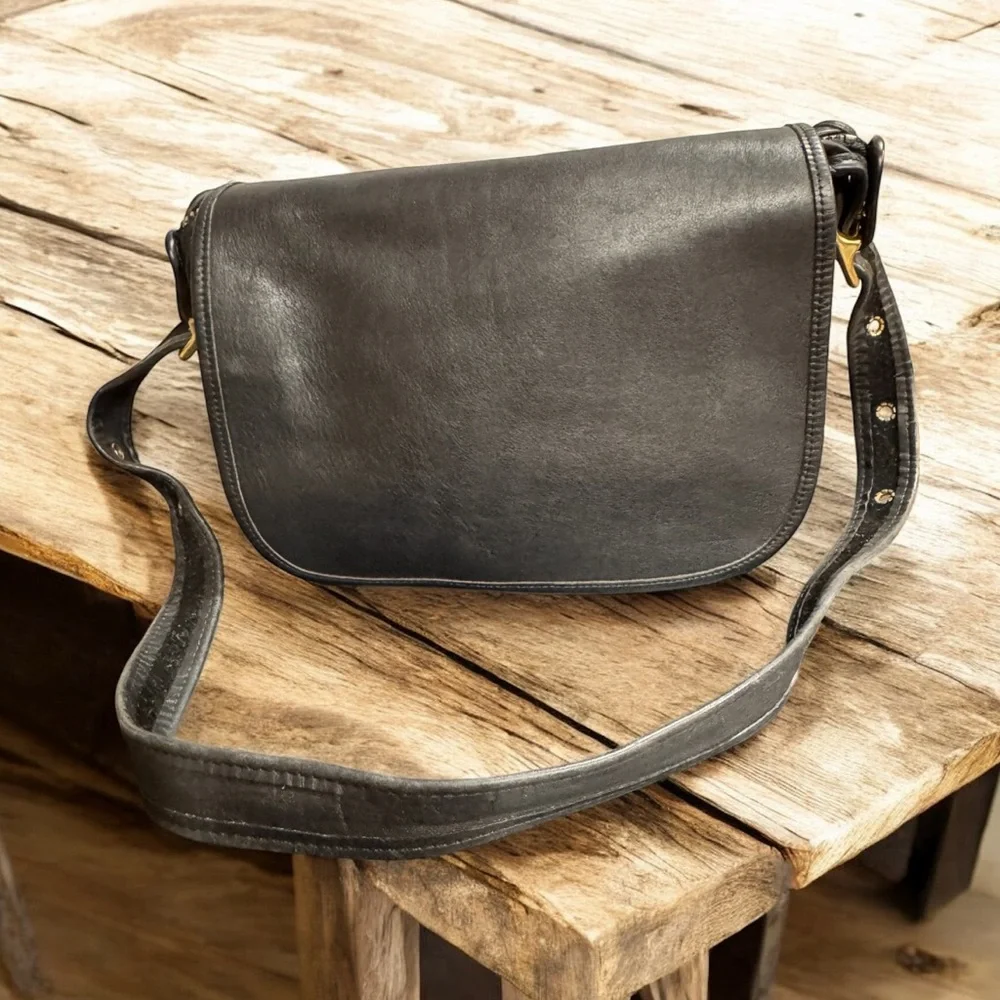 Coach sleek black