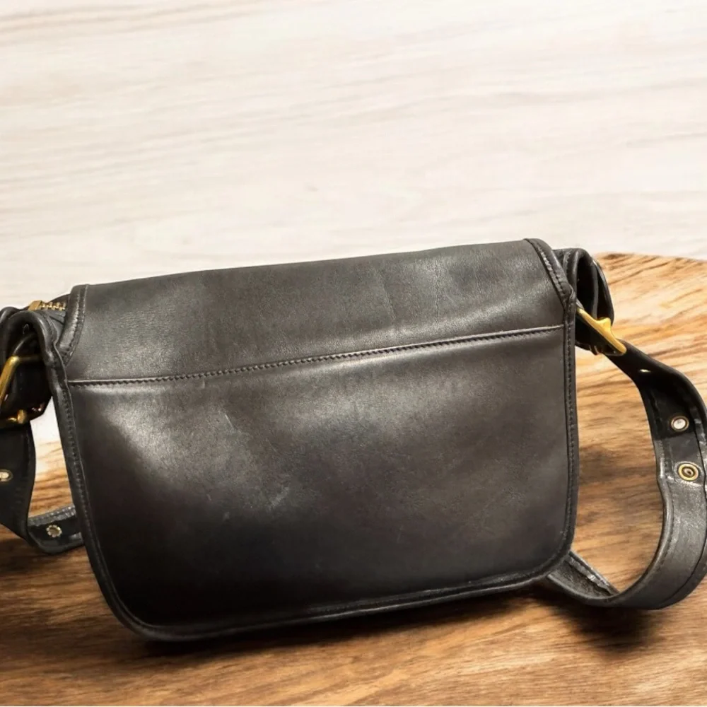 Coach sleek black